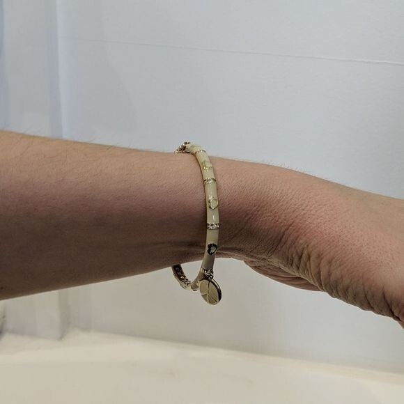 Women's Light Gold Bangle with Peace Sign Charm and Heart Details - Picture 3 of 3